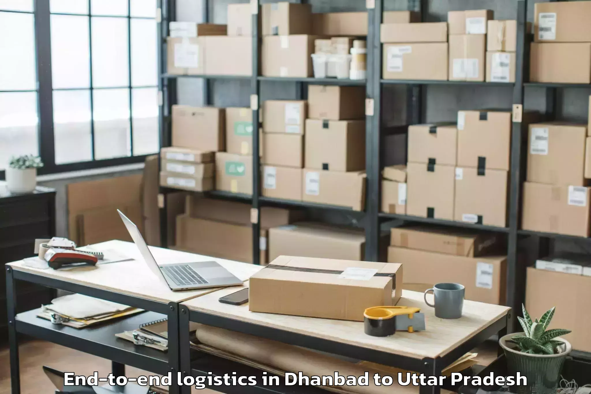 Professional Dhanbad to Belthara Road End To End Logistics